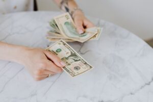 When should personal finance be taught in school, and how?